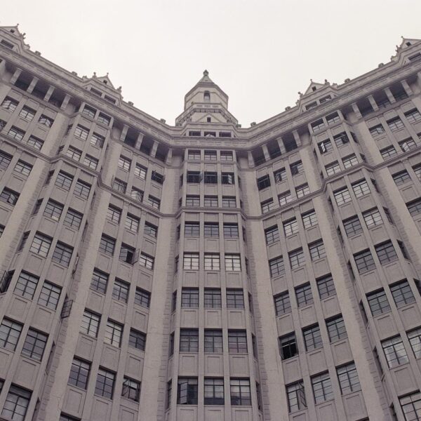 A tall, historic building with ornate architectural details.