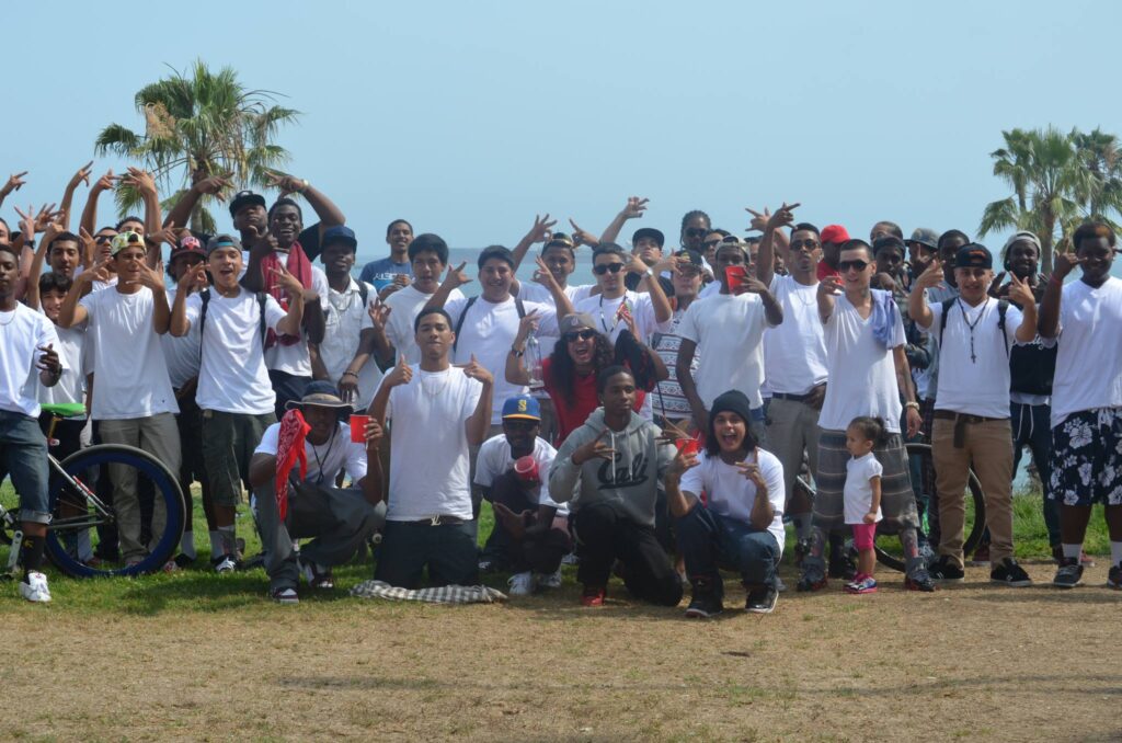 Comic cover showing intense character with dreadlocks and large eyes in background.